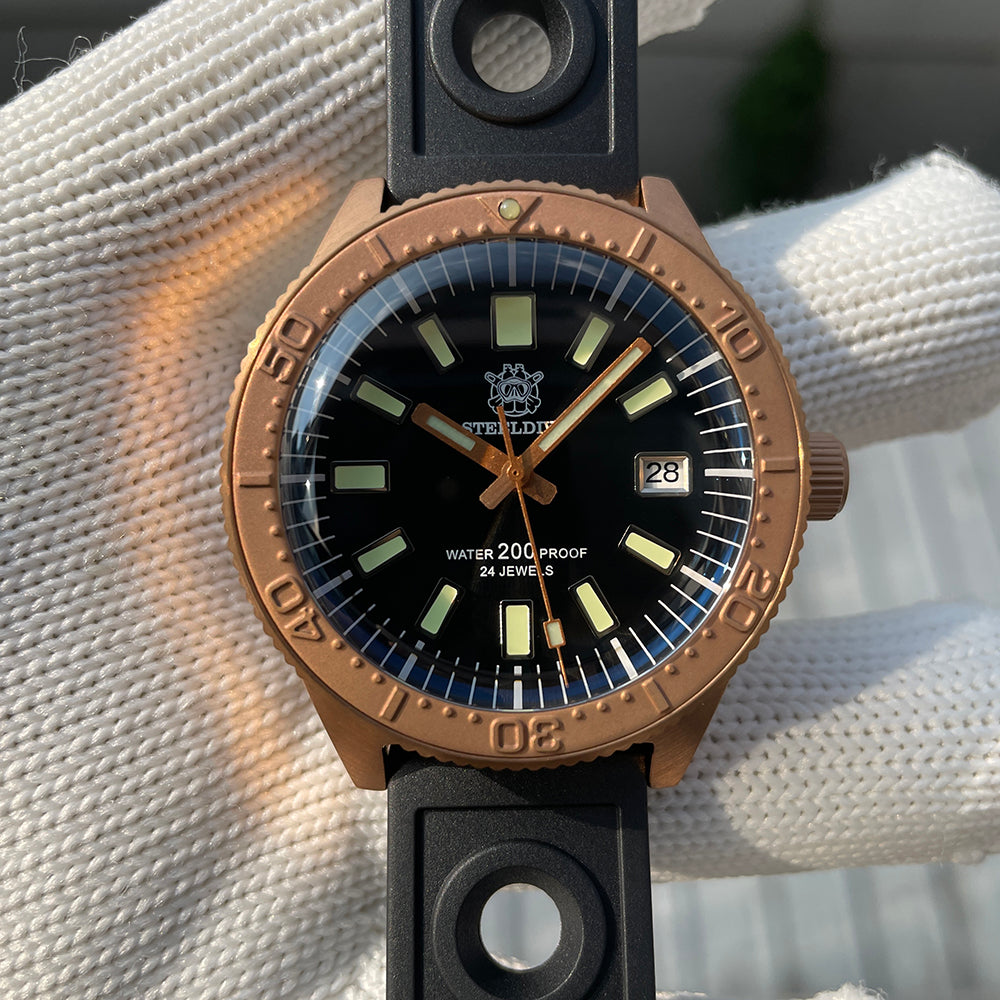Steeldive SD1962S bronze bezel wrist shot, black dial 41.9mm diver on gloved hand outdoors