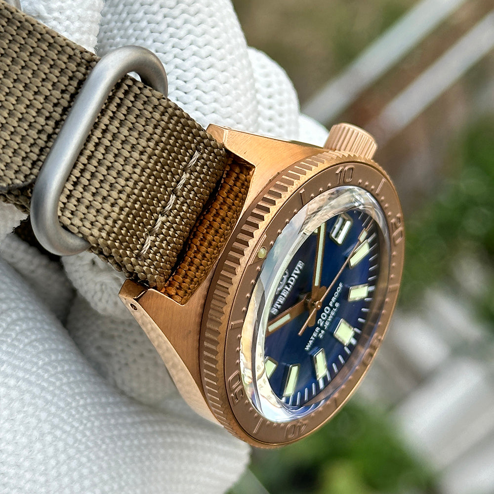 Steeldive SD1962S bronze case lug and crown macro on khaki nato strap, crown detail