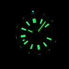 Steeldive SD1962S bronze diver lume shot, green C3 lume glow on dial indices in darkness