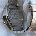 Steeldive SD1968 dive watch screw-down caseback with engraved diver helmet logo and 300M sapphire NH35 markings