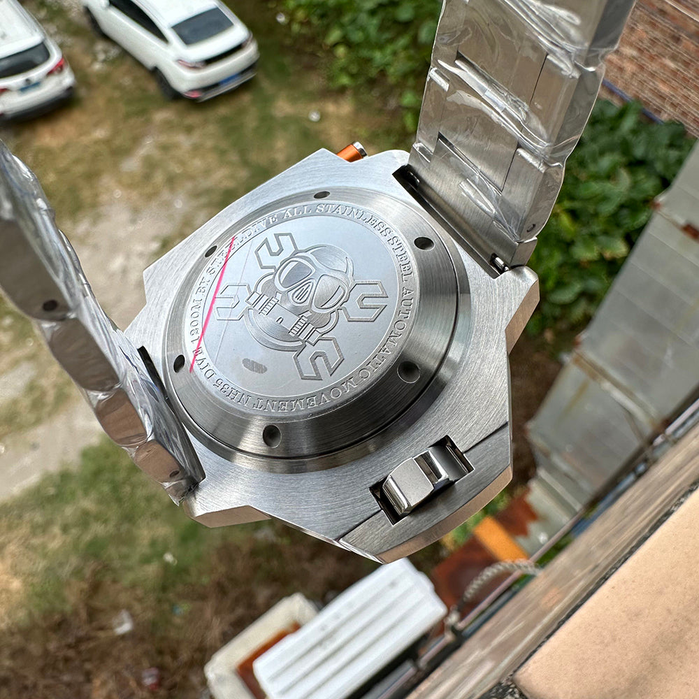 Steeldive SD1969 Proplof caseback close-up with skull diver engraving and brushed clasp, outdoor shot