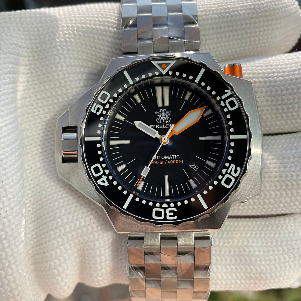 Steeldive SD1969 Proplof dial macro showing applied indices, orange seconds hand and 1200m 4000Ft text