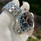 Steeldive SD1969 Proplof dive watch side profile showing crown guard, case flank and oyster end-link