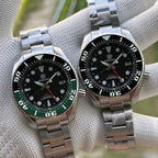 Steeldive SD1971GMT green bezel and black bezel variants on steel bracelets side by side