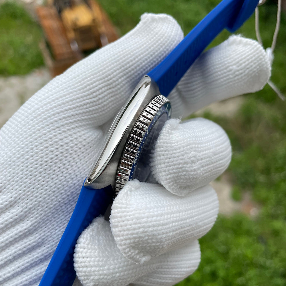 Steeldive SD1972 turtle case side view with coin-edge bezel and blue waffle rubber strap