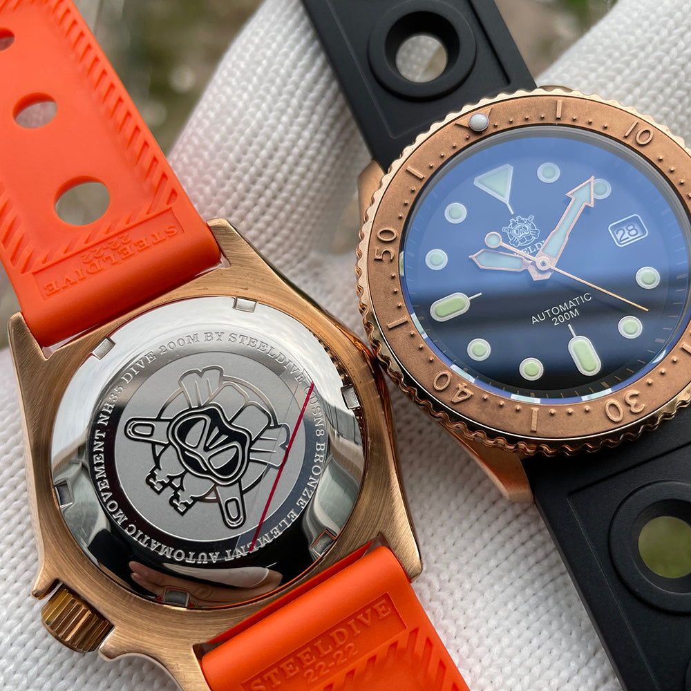 Steeldive SD1973S bronze case engraved caseback next to dial side, NH35 movement and 200M markings visible