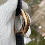 Steeldive SD1973S bronze watch case from the side showing engraved steel caseback and bronze coin-edge bezel