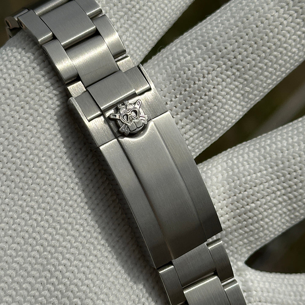 Steeldive SD1974 sapphire dive watch bracelet clasp detail with engraved turtle logo on glide-lock