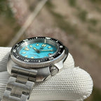 Steeldive SD1974 sapphire cyan dial dive watch crown and case side detail with engraved screw-down crown