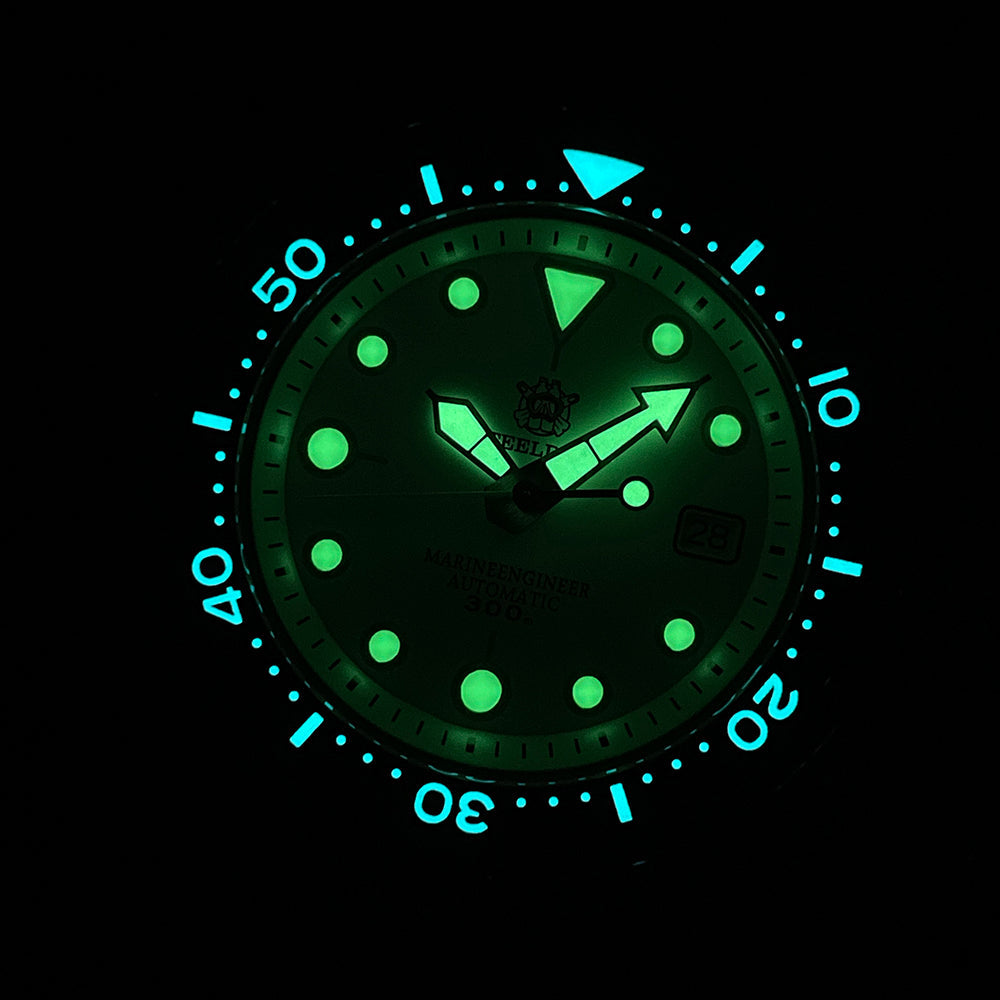 Steeldive SD1975 tuna dive watch lume shot showing strong green BGW9 glow in the dark