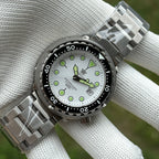 Steeldive SD1975 tuna white dial on steel bracelet outdoor wrist shot, dial detail