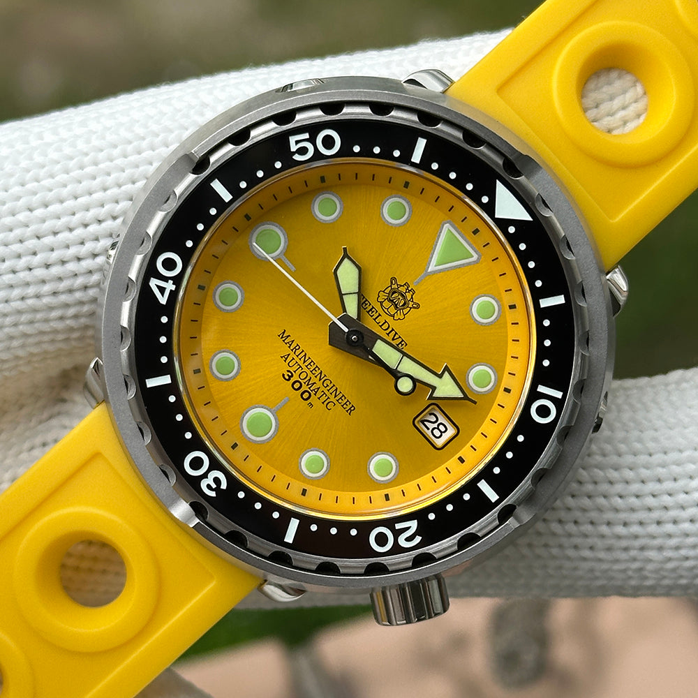 Steeldive SD1975 tuna on wrist with sunray yellow dial and yellow rubber strap, wrist shot