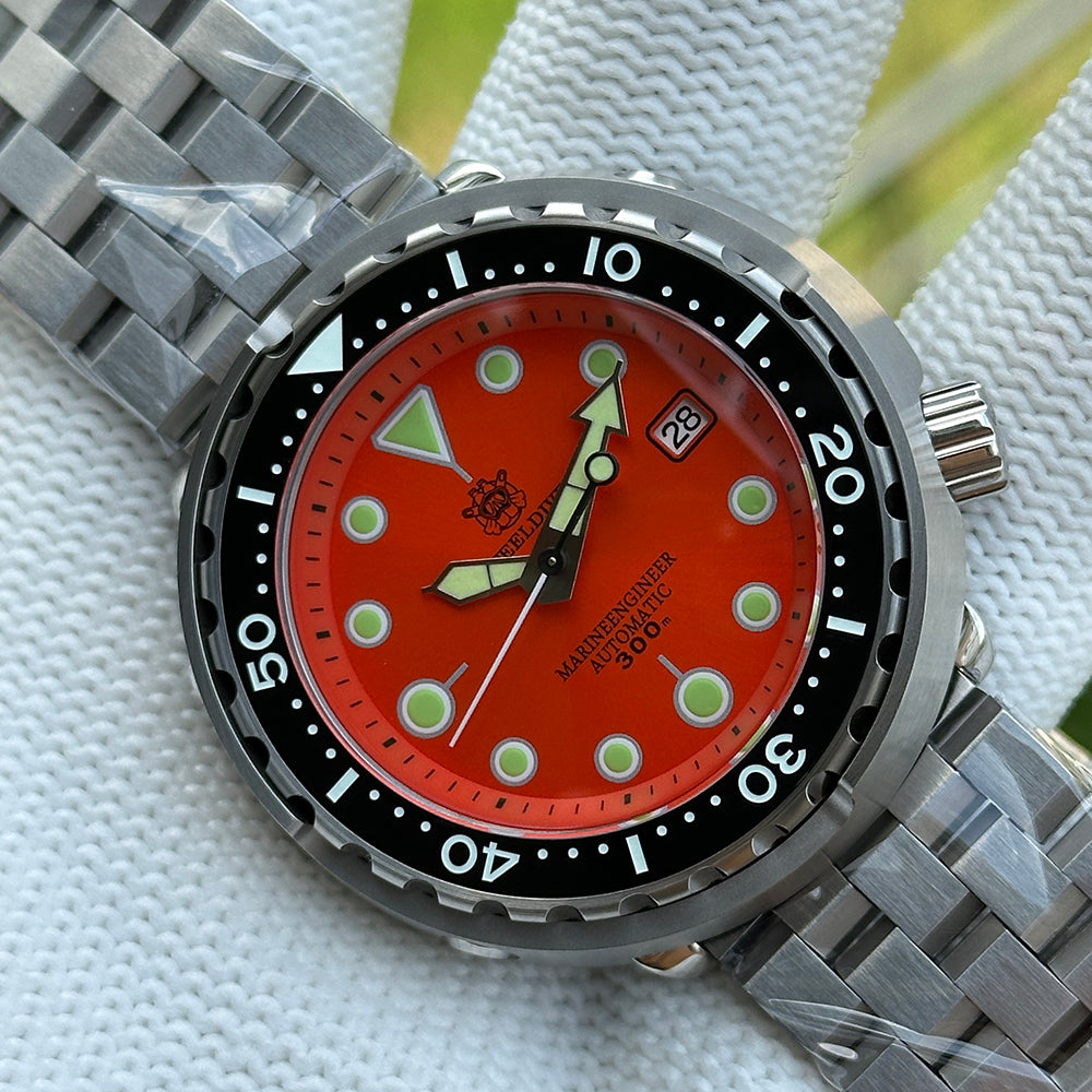 Steeldive SD1975 tuna dive watch matte orange dial on jubilee five-link steel bracelet, outdoor