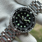 STEELDIVE SD1975K black dial dive watch on its tank bracelet, dial marked 300m