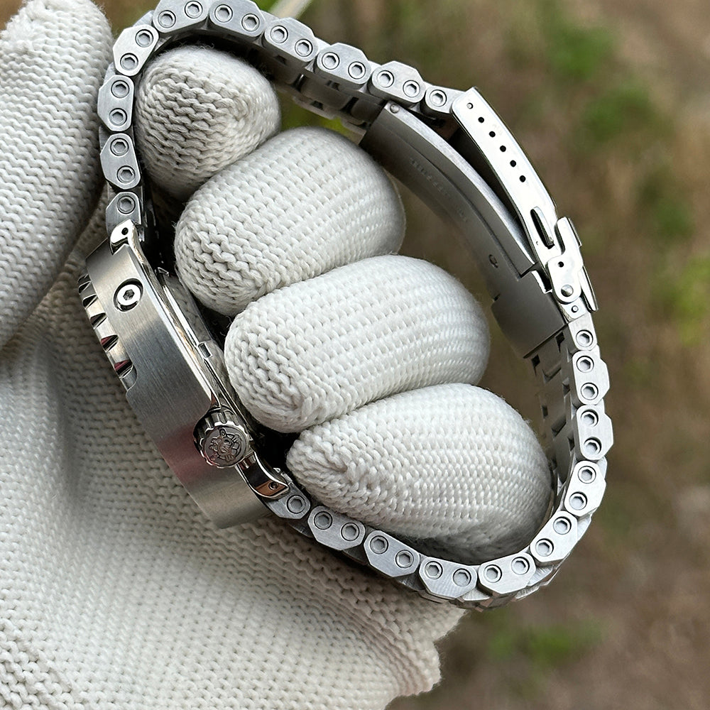 STEELDIVE SD1975K tank bracelet and clasp wrapped around a gloved hand