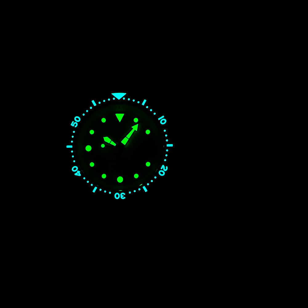 STEELDIVE SD1975N lume shot with hands, markers and bezel glowing in the dark