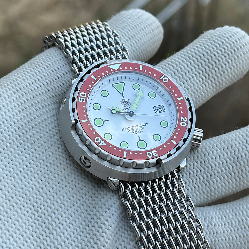 STEELDIVE SD1975N red bezel version on a steel mesh bracelet, angled view