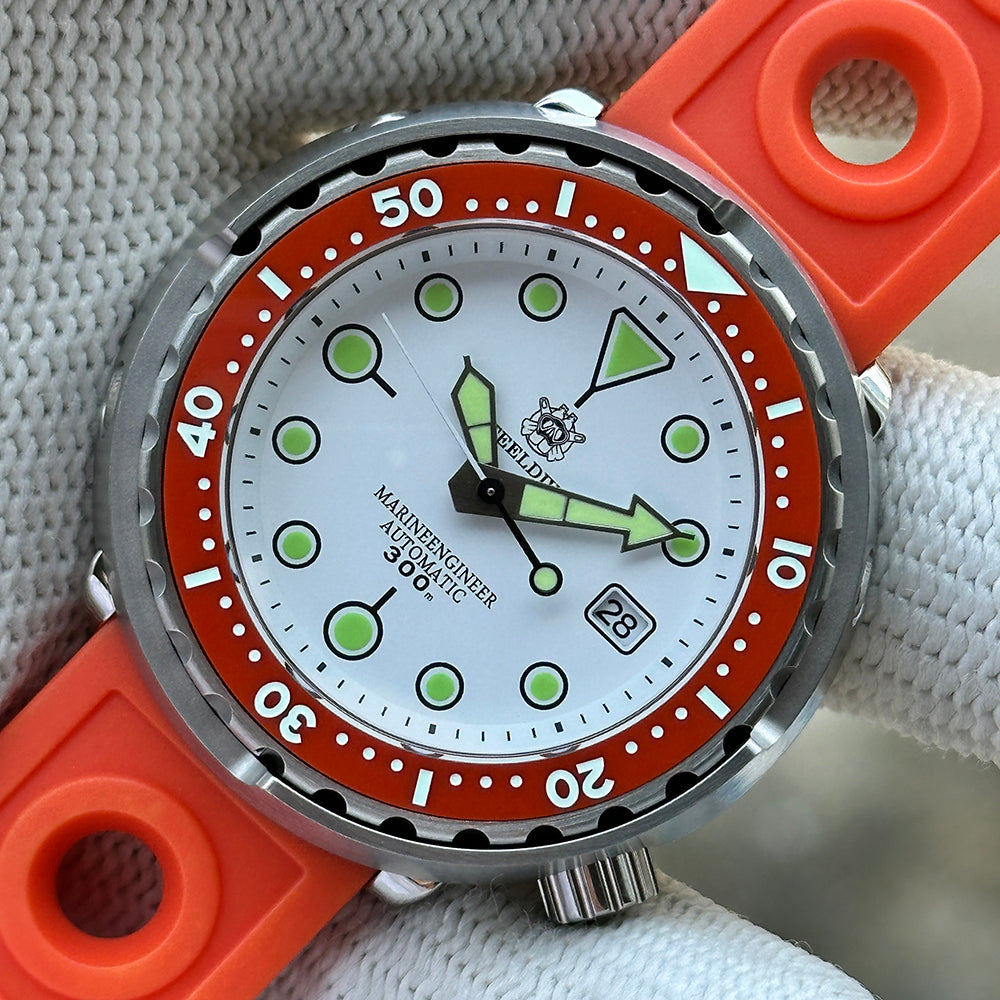 STEELDIVE SD1975N white dial with orange bezel on an orange rally-style rubber strap
