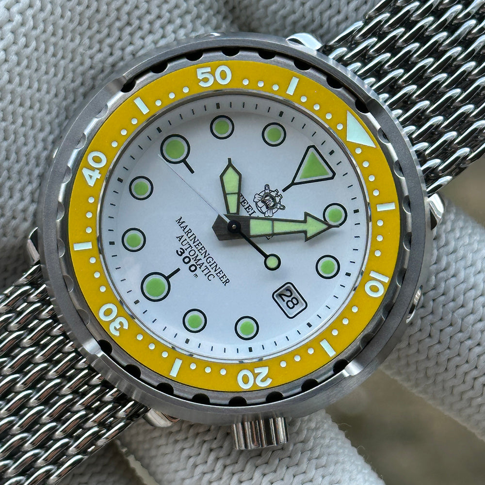 STEELDIVE SD1975N white dial with yellow bezel on a steel mesh bracelet