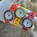 STEELDIVE SD1975N with orange, yellow and red bezels on matching rubber straps