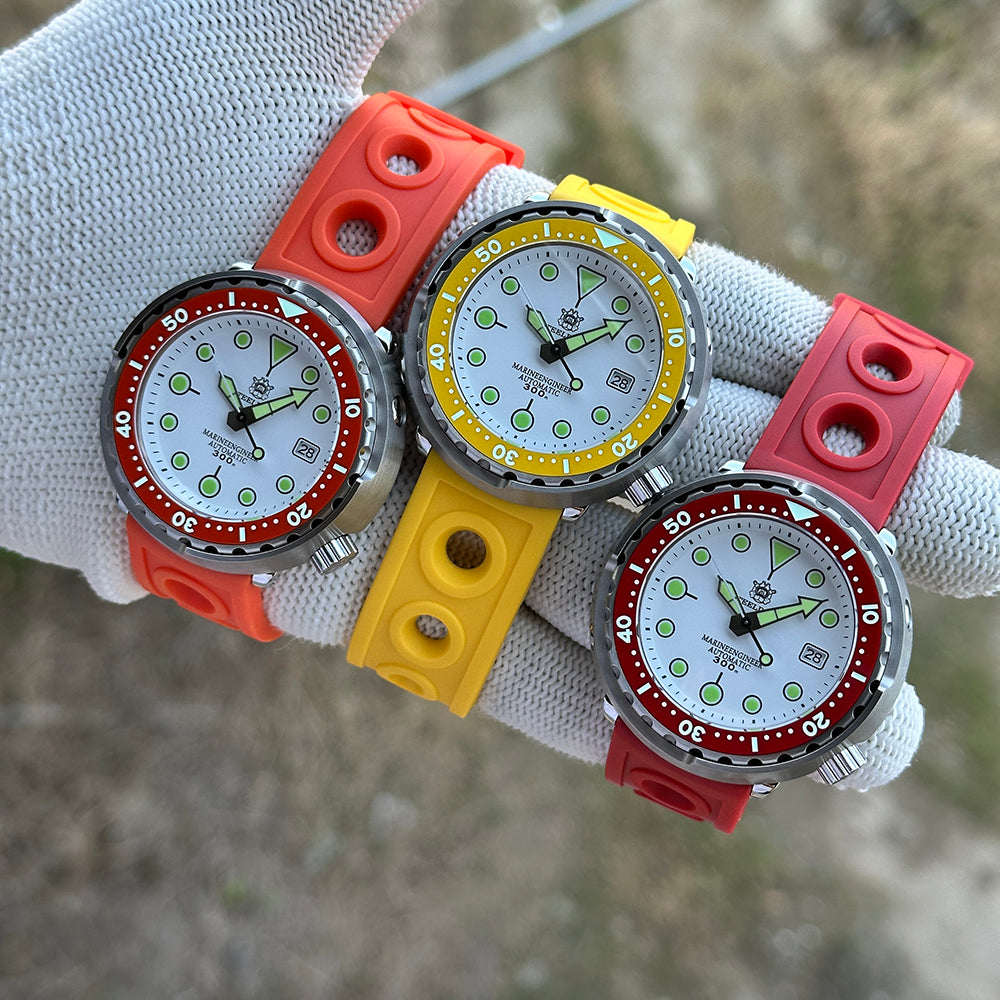 STEELDIVE SD1975N with orange, yellow and red bezels on matching rubber straps