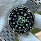 Steeldive SD1975P tuna watch with black dial and five-link jubilee bracelet, front studio view