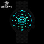 Steeldive SD1975P tuna watch with black dial showing bright green Super-LumiNova glow in the dark