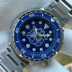 Steeldive SD1975P tuna dive watch with blue dial and steel oyster bracelet, front studio view