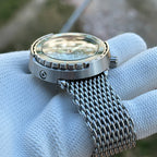 Steeldive SD1975P tuna watch green dial side profile showing thick monoblock case and mesh strap