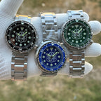 Steeldive SD1975P tuna trio on jubilee bracelets comparing black, green and blue dial finishes