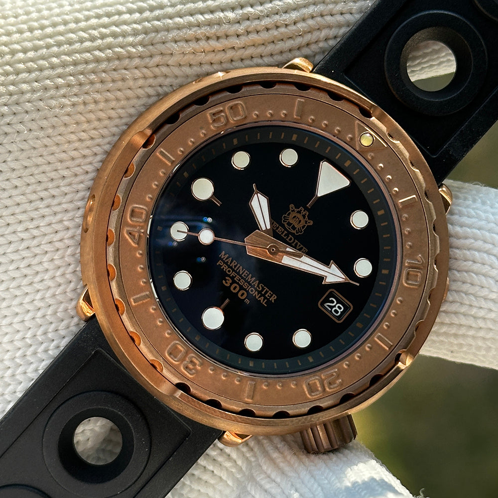 Steeldive SD1975S V1 bronze tuna dive watch with black dial and rubber strap, front view