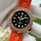 Steeldive SD1975S V2 bronze tuna dive watch with black dial and orange rubber strap, front view