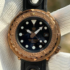 Steeldive SD1975S V1 bronze tuna black dial macro showing MARINEMASTER 300m text and date