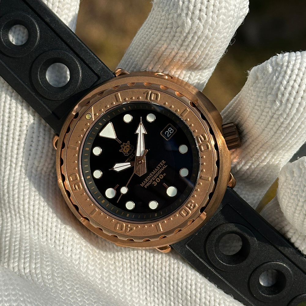 Steeldive SD1975S V1 bronze tuna diver front view wrapped in white cloth with black perforated strap