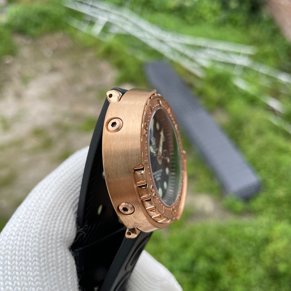 Steeldive SD1975S V2 bronze dive watch bezel and shrouded case detail with exposed lugs and screws