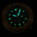 Steeldive SD1975S V2 bronze dive watch glowing with C3 green lume on indices and hands in the dark