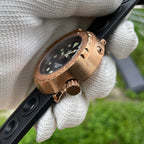 Steeldive SD1975S V2 bronze dive watch crown close-up showing signed screw-down crown and case flank