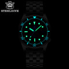 Steeldive SD1979 dive watch glowing C3 BGW9 lume on indices and hands in the dark