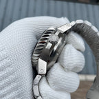 Steeldive SD1982 side profile showing screw-down crown with engraved logo and coin-edge bezel