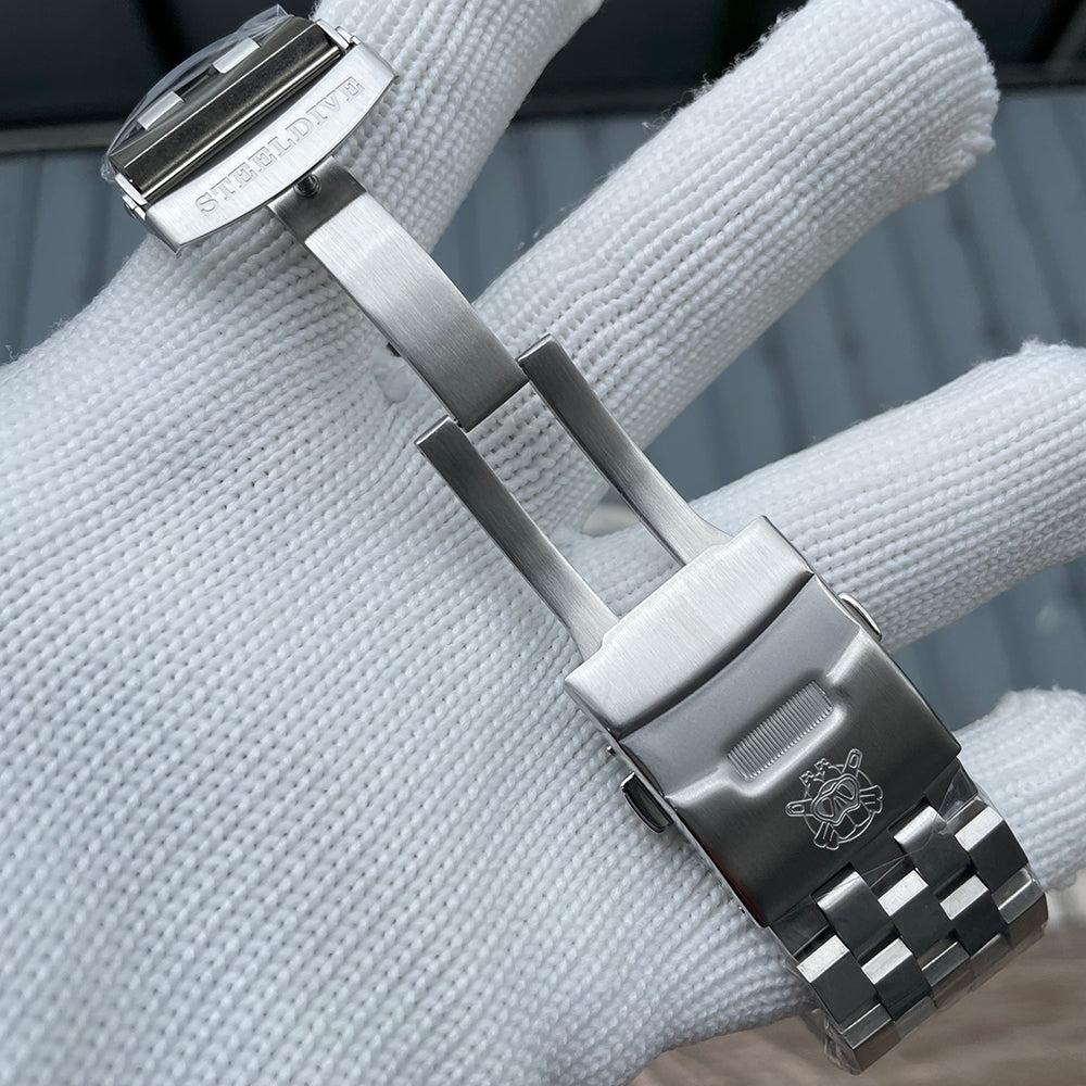 Steeldive SD1982 oyster bracelet diver clasp shown open with push-button safety release