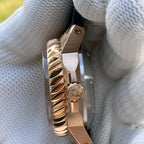 Steeldive SD1982S bronze coin-edge bezel and signed crown side detail with brushed mid-case