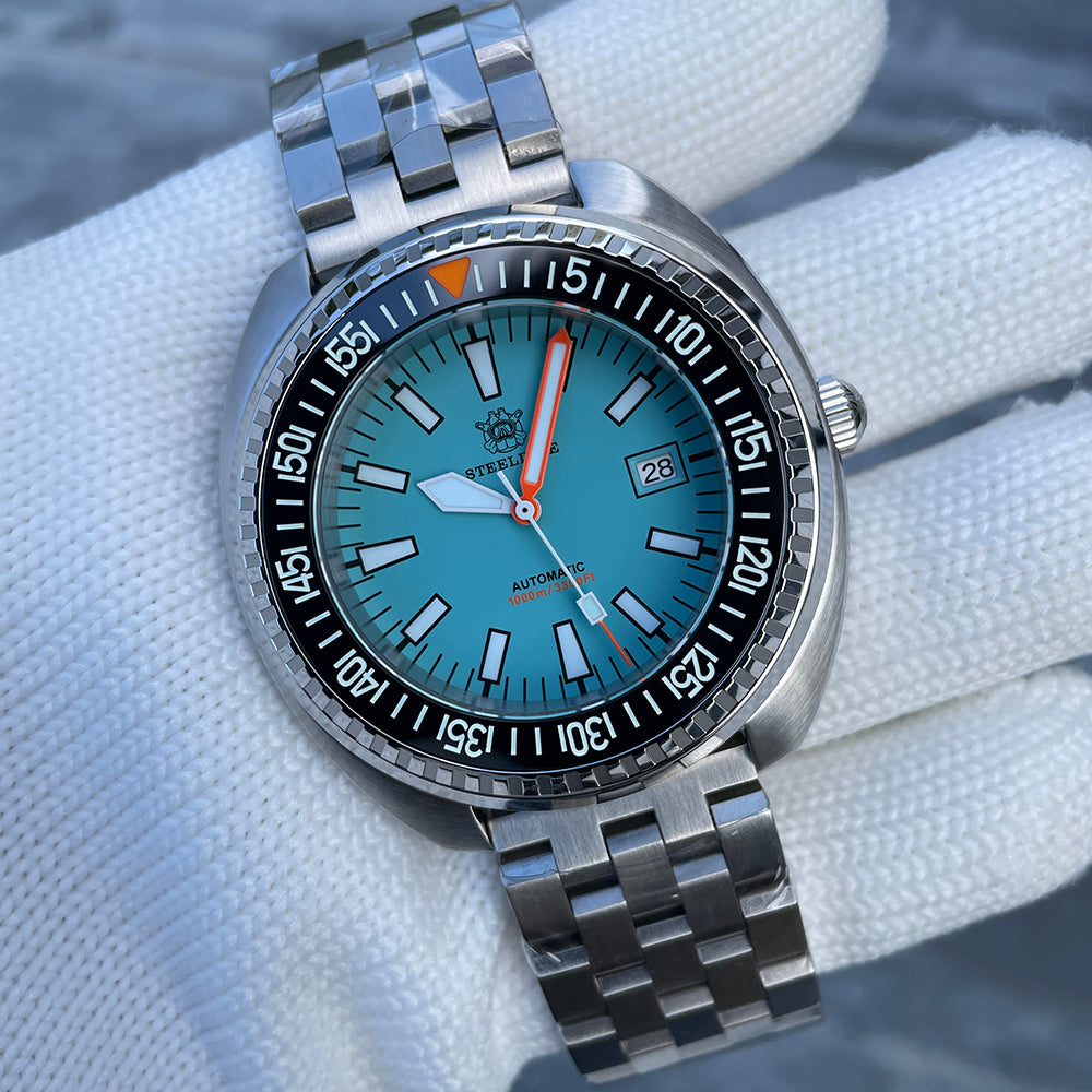 Steeldive SD1983 ceramic dive watch on jubilee steel bracelet, angled side view of ice blue dial