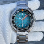 Steeldive SD1983 ceramic dive watch close-up on oyster steel bracelet showing ice blue dial detail