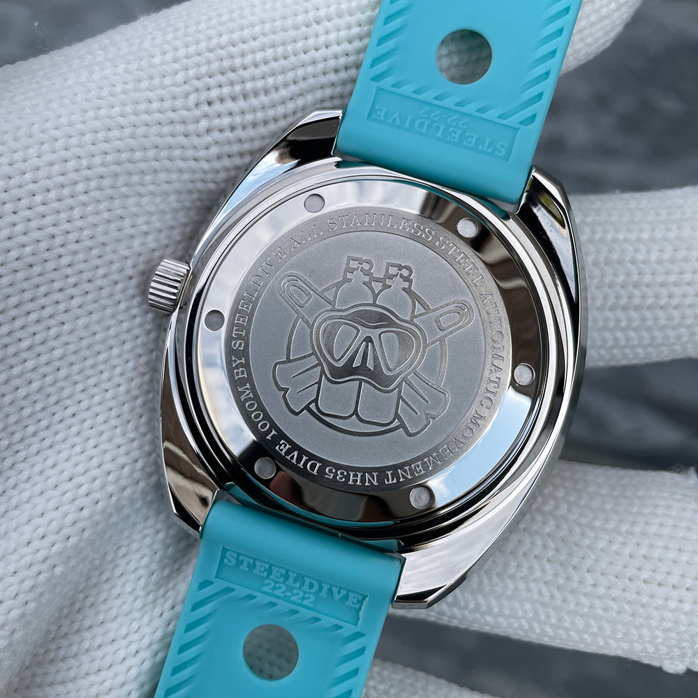 Steeldive SD1983 ceramic dive watch screw-down caseback with engraved diver logo and NH35 1000M text