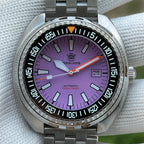 Steeldive SD1983 purple dial 1000m 3300ft dive watch front close-up on jubilee bracelet