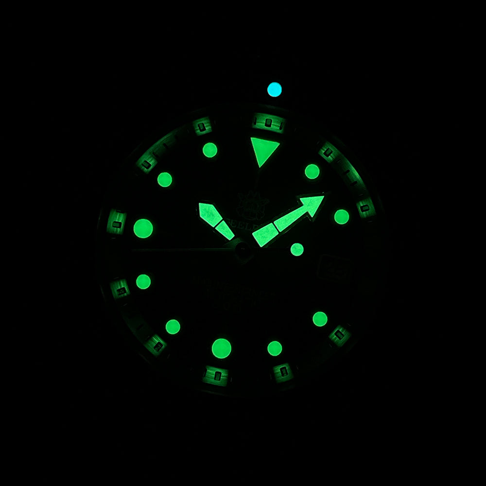 Steeldive SD1986 tuna watch glowing green C3 lume in the dark, lume shot
