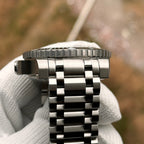 Steeldive SD1987 jubilee-style steel bracelet attached to dive watch case, side profile view