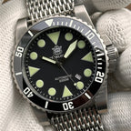 Steeldive SD1987 dive watch black dial C3 lume indices and Mercedes hands macro, dial detail