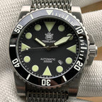 Steeldive SD1987 dive watch black dial C3 lume on shark mesh bracelet, front close-up