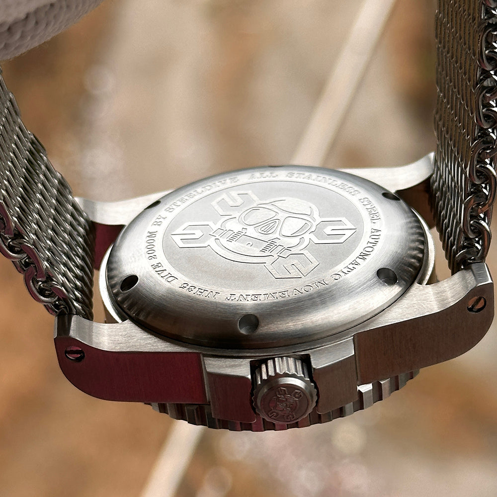 Steeldive SD1987 stainless steel caseback engraved with diver skull logo and NH35 2000M text